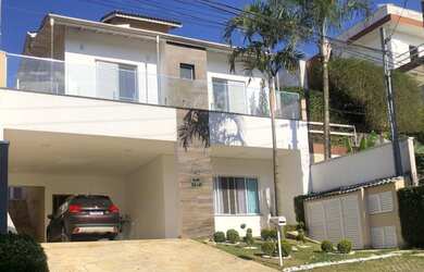 Imagem: A casa em condomínio possui 4 Dormitórios, 5 Banheiros, 4