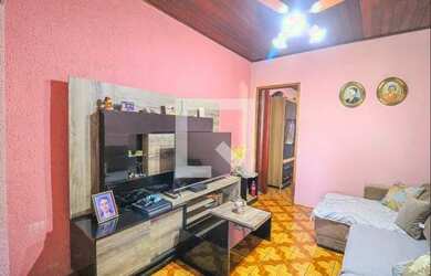 Imagem: A casa possui 4 Dormitórios, 2 Banheiros, 2 Vagas na garagem