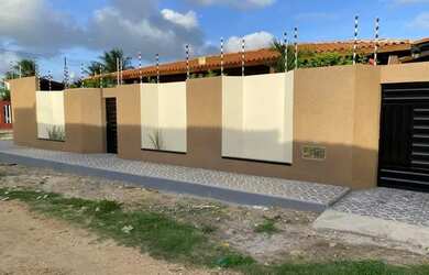 Imagem: A casa possui 3 Dormitórios, 5 Banheiros, 5 Vagas na garagem