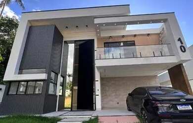 Imagem: A casa em condomínio possui 5 Dormitórios, 5 Banheiros, 4