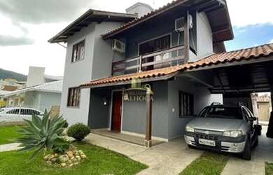 Imagem: A casa e possui 3 Dormitórios, Suítes, 3 Banheiros, 2 Vagas