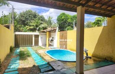 Imagem: A casa possui 3 Dormitórios, 2 Banheiros, 3 Vagas na garagem