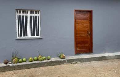 Imagem: A casa possui 2 Dormitórios e 1 Banheiro e está localizado