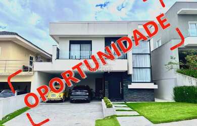 Imagem: A casa em condomínio possui 4 Dormitórios, 4 Banheiros, 2