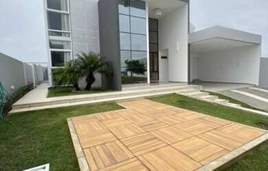 Imagem: A casa possui 4 Dormitórios, 2 Vagas na garagem e está localizado