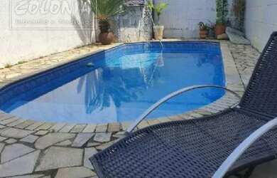 Imagem: A casa possui 3 Dormitórios, 4 Banheiros, 4 Vagas na garagem