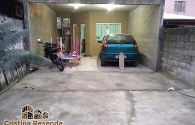 Imagem: A casa possui 2 Dormitórios, 3 Banheiros, 2 Vagas na garagem