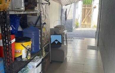 Imagem: A casa possui 2 Dormitórios, 2 Banheiros, 1 Vaga na garagem