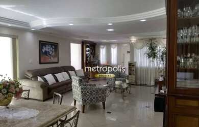 Imagem: A casa possui 4 Dormitórios, 5 Banheiros, 5 Vagas na garagem