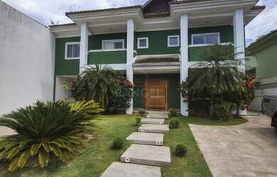 Imagem: A casa em condomínio possui 4 Dormitórios, 5 Banheiros, 5