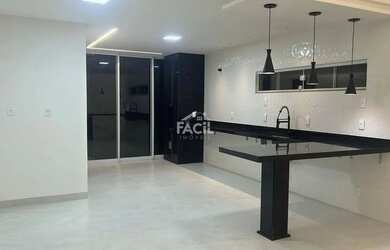 Imagem: A casa possui 3 Dormitórios, 3 Banheiros, 2 Vagas na garagem