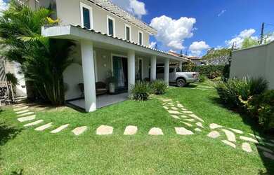 Imagem: A casa possui 3 Dormitórios, 4 Banheiros, 4 Vagas na garagem