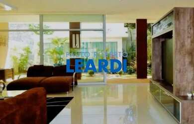 Imagem: A casa em condomínio possui 4 Dormitórios, 5 Banheiros, 5