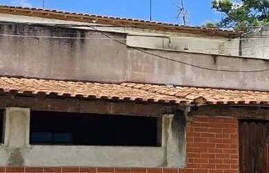 Imagem: A casa possui 3 Dormitórios, 4 Banheiros, 3 Vagas na garagem