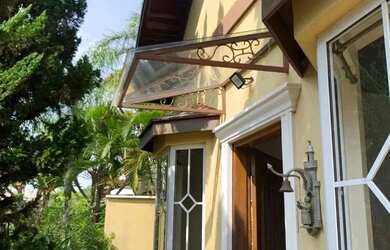 Imagem: A casa em condomínio possui 4 Dormitórios, 5 Banheiros, 4