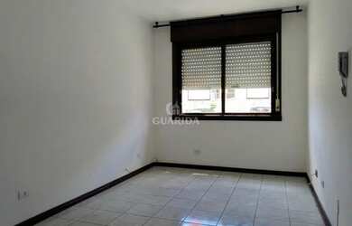 Imagem: O apartamento possui 1 Dormitório, 1 Banheiro, 1 Vaga na garagem