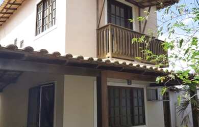 Imagem: A casa possui 2 Dormitórios, 2 Banheiros, 3 Vagas na garagem