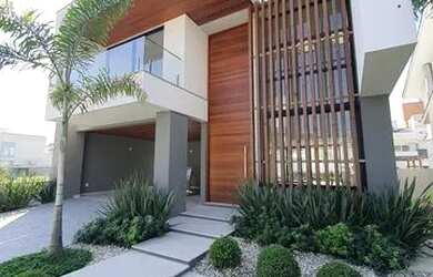 Imagem: A casa possui 3 Dormitórios, 3 Banheiros, 2 Vagas na garagem