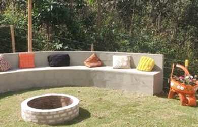 Imagem: A casa possui 2 Dormitórios, 4 Vagas na garagem e está localizado