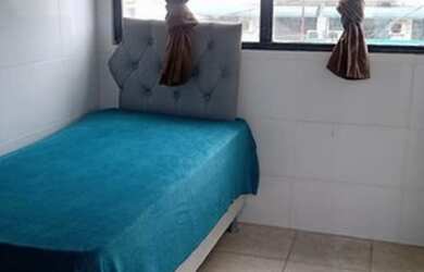 Imagem: O quarto está localizado em Vila Mathias, Santos para alugar