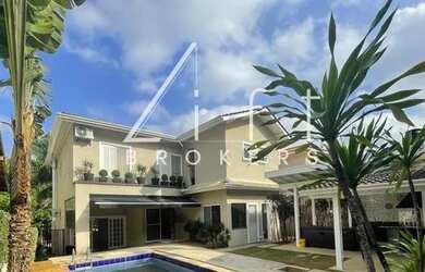 Imagem: A casa em condomínio possui 4 Dormitórios, 5 Banheiros, 4