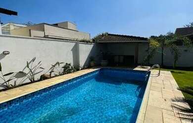 Imagem: A casa em condomínio possui 4 Dormitórios, 5 Banheiros, 4