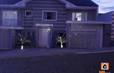 Imagem: A casa possui 3 Dormitórios, 3 Banheiros, 4 Vagas na garagem