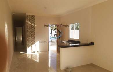 Imagem: A casa possui 2 Dormitórios, 2 Banheiros, 2 Vagas na garagem