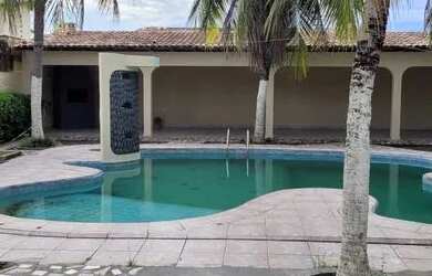 Imagem: A casa possui 3 Dormitórios e 4 Banheiros e está localizado