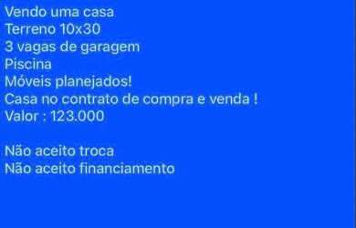 Imagem: A casa possui 2 Dormitórios, 2 Banheiros, 3 Vagas na garagem
