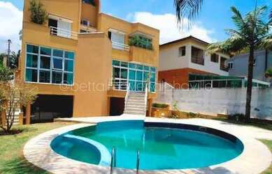 Imagem: A casa em condomínio possui 4 Dormitórios, 4 Banheiros, 3