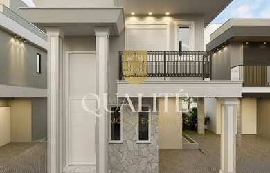 Imagem: A casa possui 3 Dormitórios, 3 Banheiros, 2 Vagas na garagem