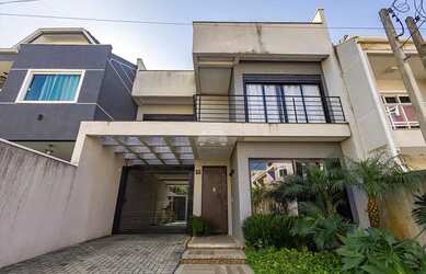 Imagem: A casa à venda possui 3 Dormitórios, 4 Banheiros, 2 Vagas