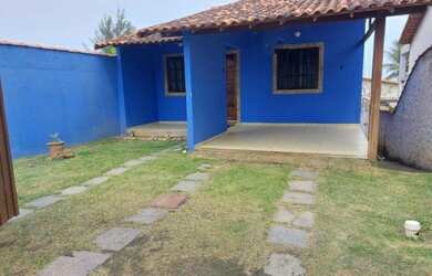 Imagem: A casa possui 2 Dormitórios, 1 Banheiro, 2 Vagas na garagem