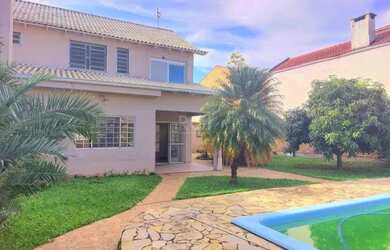 Imagem 5: Casa em Guaíba. Piscina, Churrasqueira, Área de serviçoeLareira