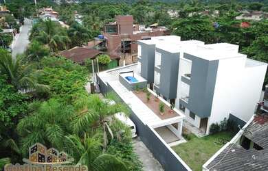 Imagem: A casa em condomínio possui 5 Dormitórios, 3 Banheiros, 2