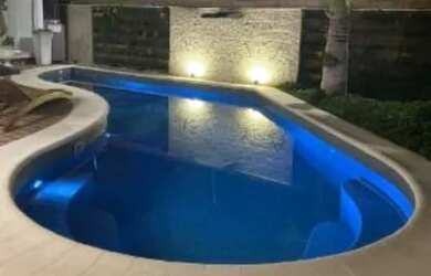 Imagem: A casa possui 3 Dormitórios, 3 Banheiros, 2 Vagas na garagem