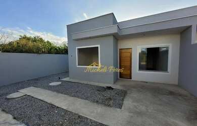 Imagem: A casa possui 2 Dormitórios, 2 Banheiros, 2 Vagas na garagem