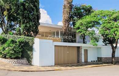 Imagem: A casa possui 5 Dormitórios, 5 Banheiros, 5 Vagas na garagem