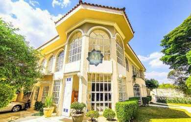 Imagem: A casa possui 5 Dormitórios, 5 Banheiros, 5 Vagas na garagem