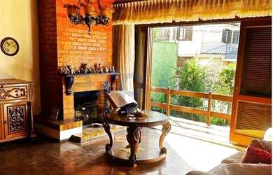 Imagem: A casa possui 3 Dormitórios, 3 Banheiros, 3 Vagas na garagem