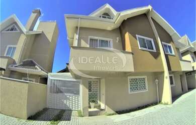 Imagem: A casa possui 3 Dormitórios, 2 Banheiros, 2 Vagas na garagem