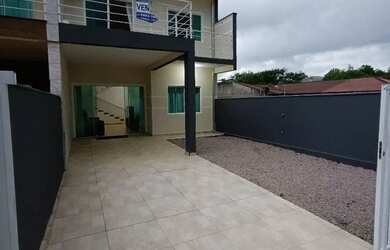 Imagem: A casa possui 4 Dormitórios, 4 Banheiros, 1 Vaga na garagem