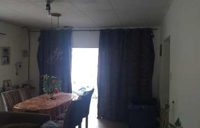 Imagem: A casa possui 5 Dormitórios, 3 Banheiros, 2 Vagas na garagem