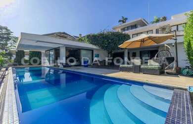 Imagem: A casa em condomínio possui 4 Dormitórios, 4 Banheiros, 5