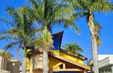 Imagem: A casa possui 3 Dormitórios, 5 Banheiros, 5 Vagas na garagem