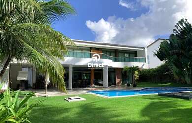 Imagem: A casa possui 5 Dormitórios, 5 Banheiros, 4 Vagas na garagem