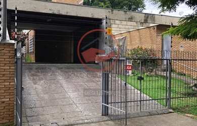 Imagem: A casa possui 3 Dormitórios, 4 Banheiros, 4 Vagas na garagem