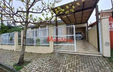 Imagem: A casa possui 3 Dormitórios, 2 Banheiros, 3 Vagas na garagem