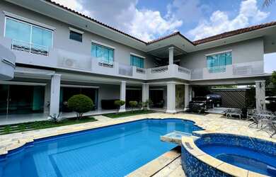 Imagem: A casa possui 5 Dormitórios, 5 Banheiros, 5 Vagas na garagem